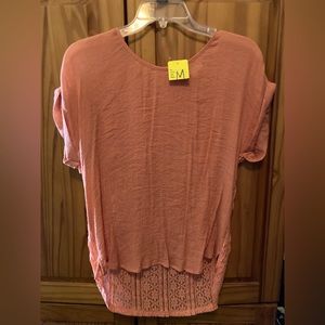 Like new peach top longer in the back